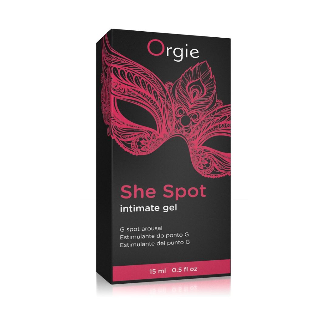 Schwarze Verpackung mit pinkem Masken-Design. Aufschrift: She Spot Intimate Gel. 15 ml.