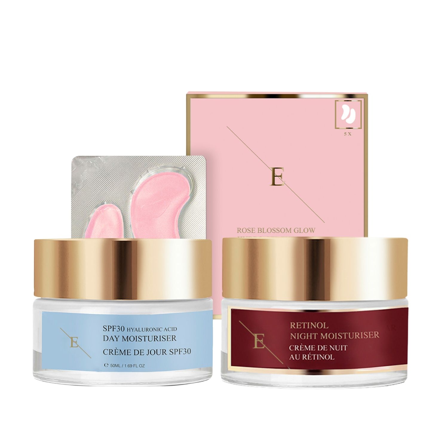 Zwei Tiegel und eine Schachtel. Aufschrift: SPF30, Retinol, Creme de Jour, Creme de Nuit. Goldfarbene Deckel, rosa Verpackung, Augenpads.