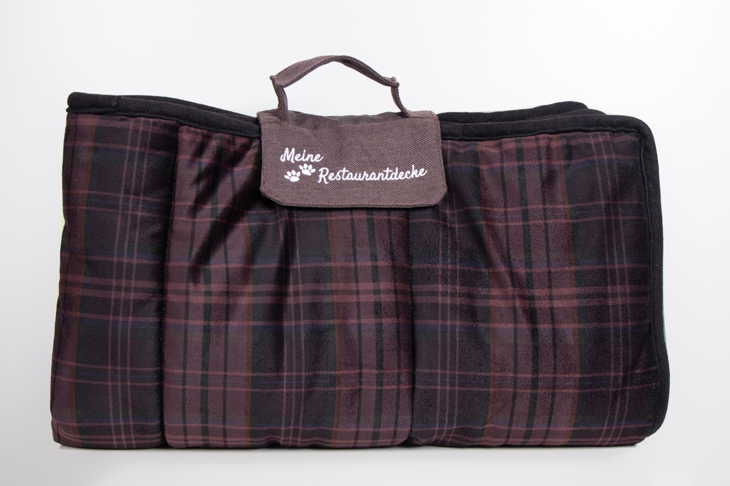 Gekaroerte braune Decke mit Tasche und Aufschrift "Meine Restaurantdecke".