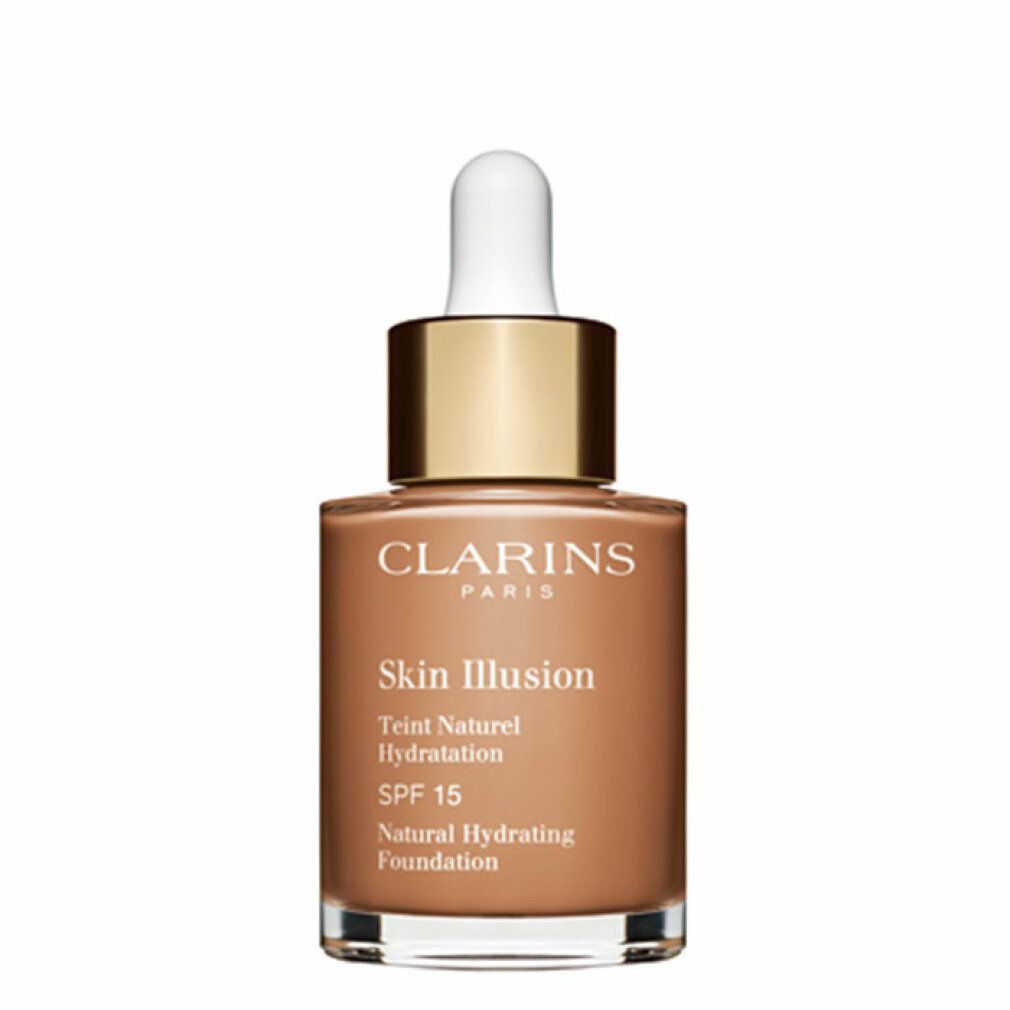 Clarins Skin Illusion Foundation. Braune Flüssigkeit in Glasflasche mit goldener Kappe und Pipette. SPF 15.