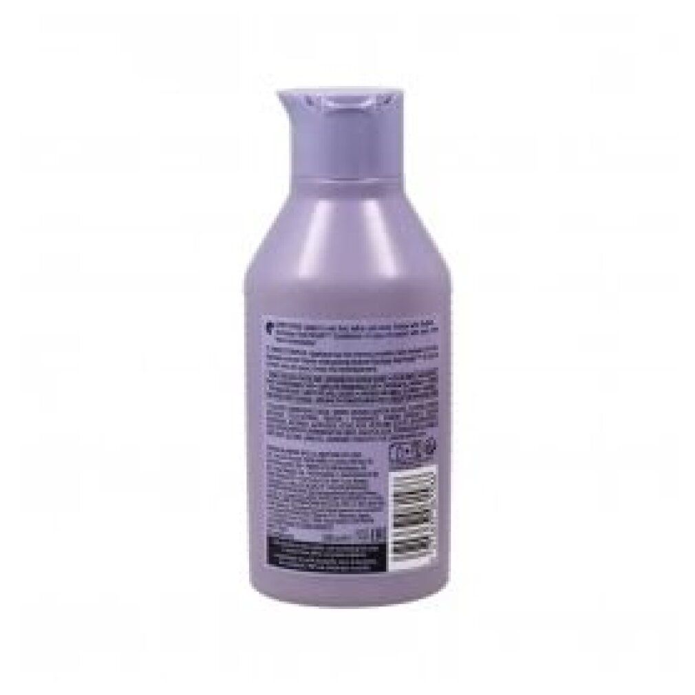 Flasche mit lila Shampoo. Aufschrift: Redken, Blondage High Bright Shampoo. 300ml. pH-ausgeglichene Formel.