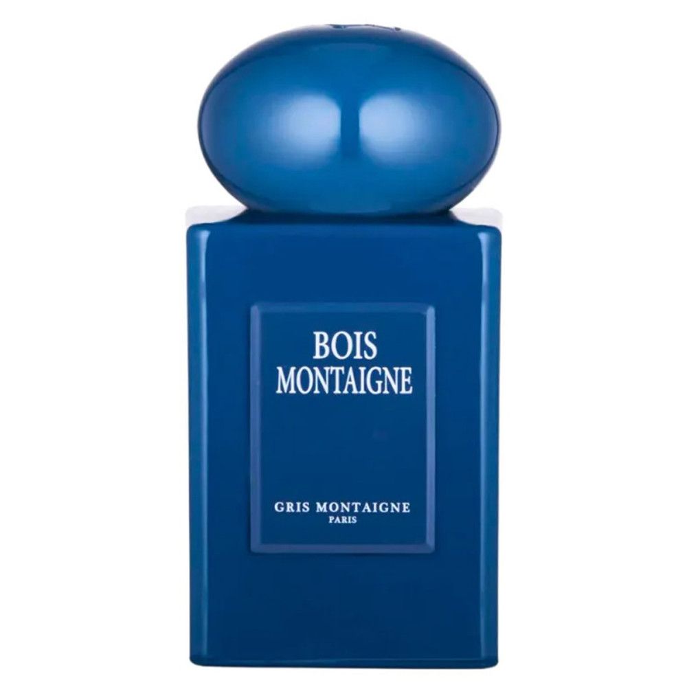 Blaues Parfümflakon mit Kappe. Aufschrift: Bois Montaigne, Gris Montaigne Paris.