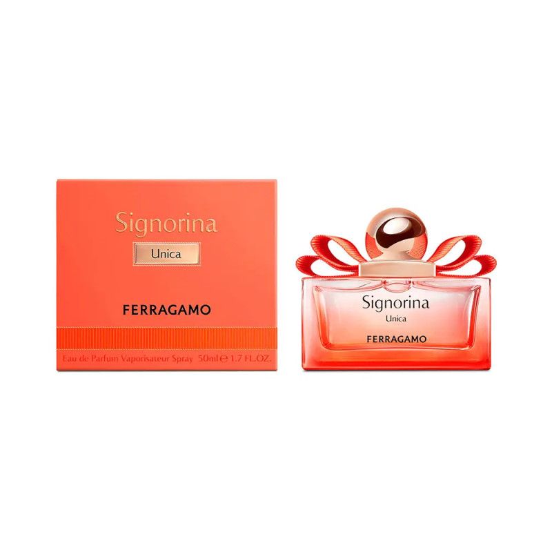 FERRAGAMO Signorina Unica Eau de Parfum Flakon und Verpackung. Orangefarbene Box und Flakon mit Schleifen-Applikation. 50 ml.