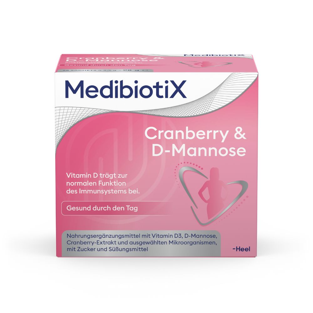 Rosa Verpackung mit "MedibiotiX Cranberry & D-Mannose". Enthält Vitamin D. Text: "Gesund durch den Tag".