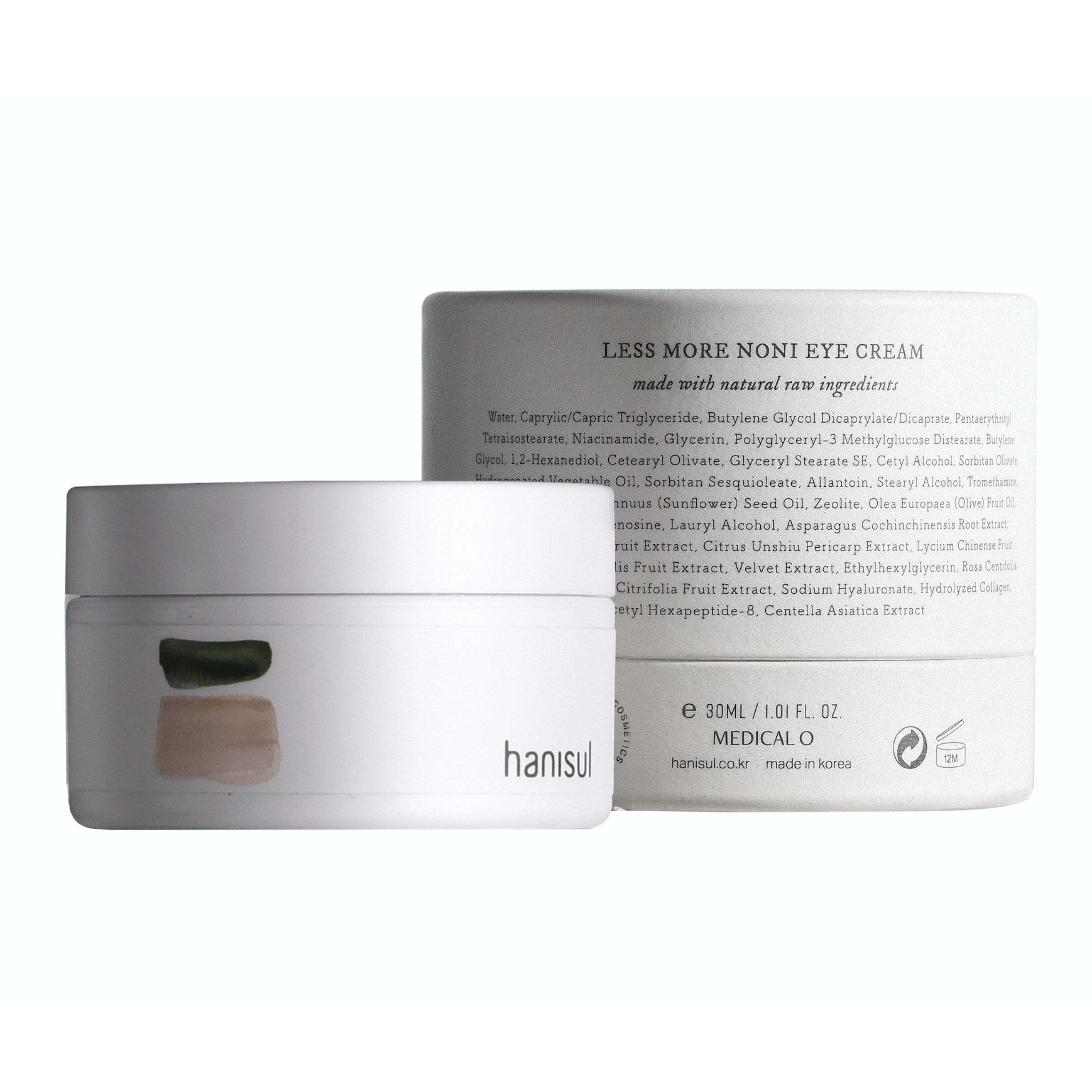 Weiße Tiegel und Verpackung mit Produktinformationen. Aufschrift: Hanisul, LESS MORE NONI EYE CREAM. Aufdruck mit Inhaltsstoffen.