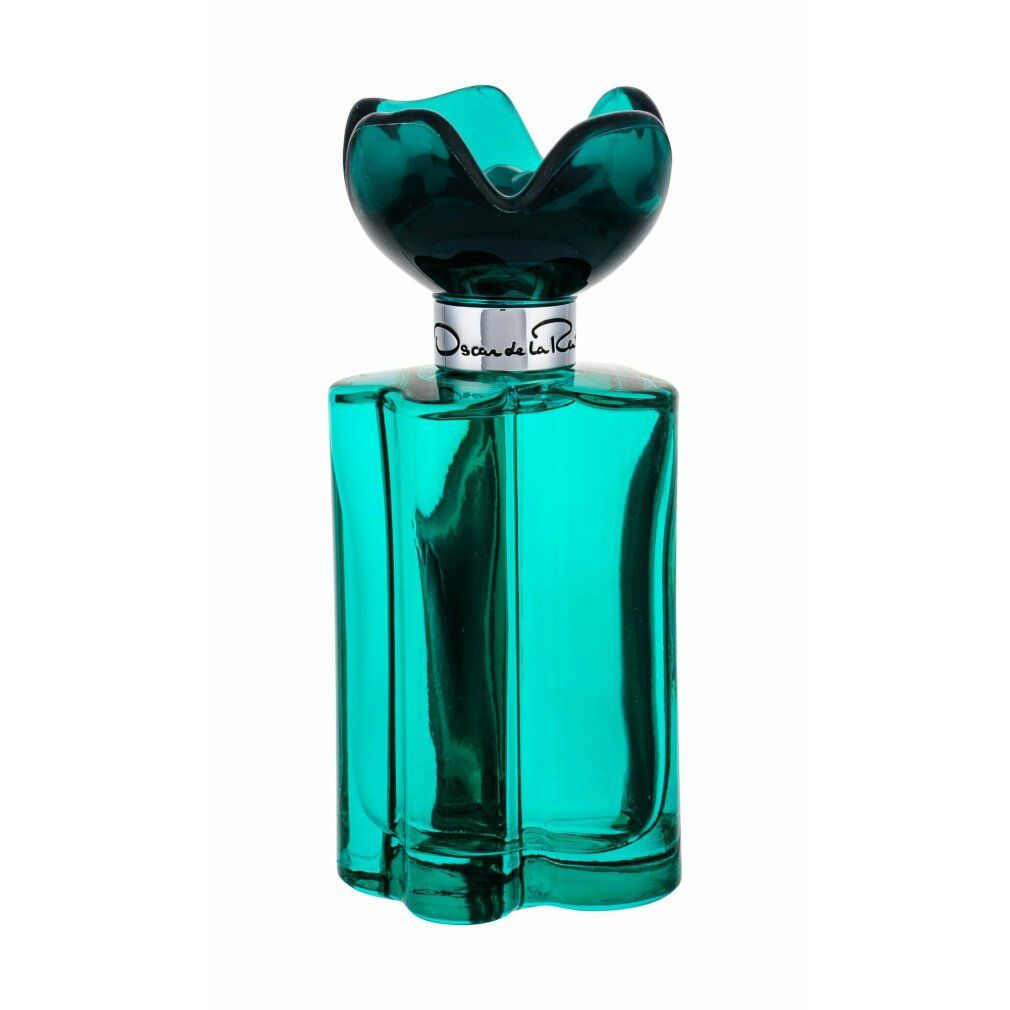 Grünes Parfüm in rechteckiger Flasche mit blütenförmigem Deckel. Aufschrift: Oscar de la Renta. Flakon mit silbernem Hals.