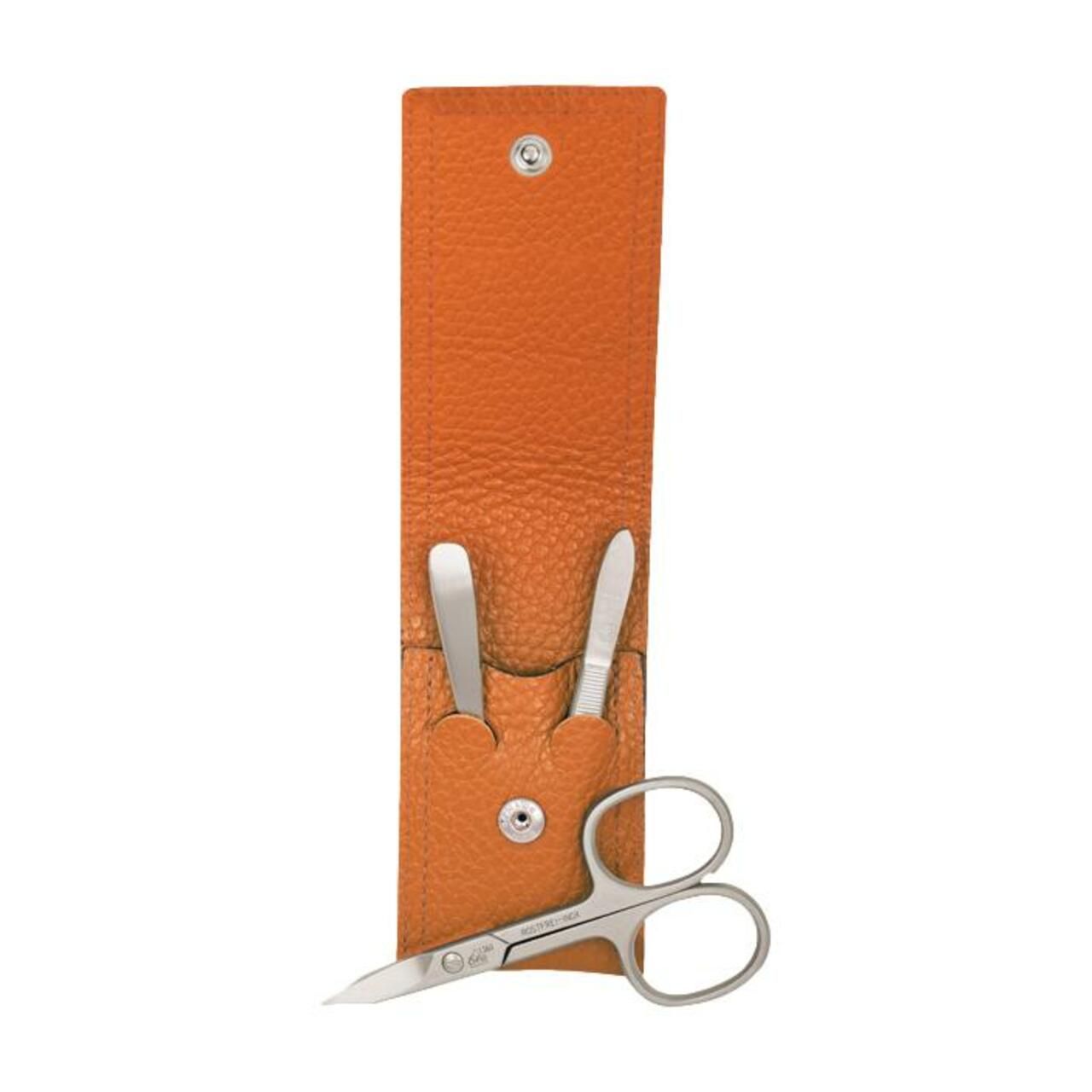 Maniküre-Set mit Schere, Nagelhautschieber und Pinzette in einem orangefarbenen Lederetui.