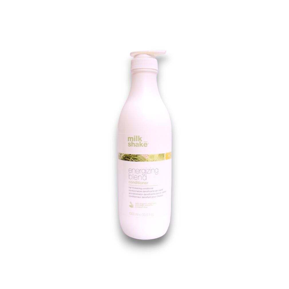Weiße Pumpflasche mit "milk shake" und "energizing blend conditioner" Aufschrift.