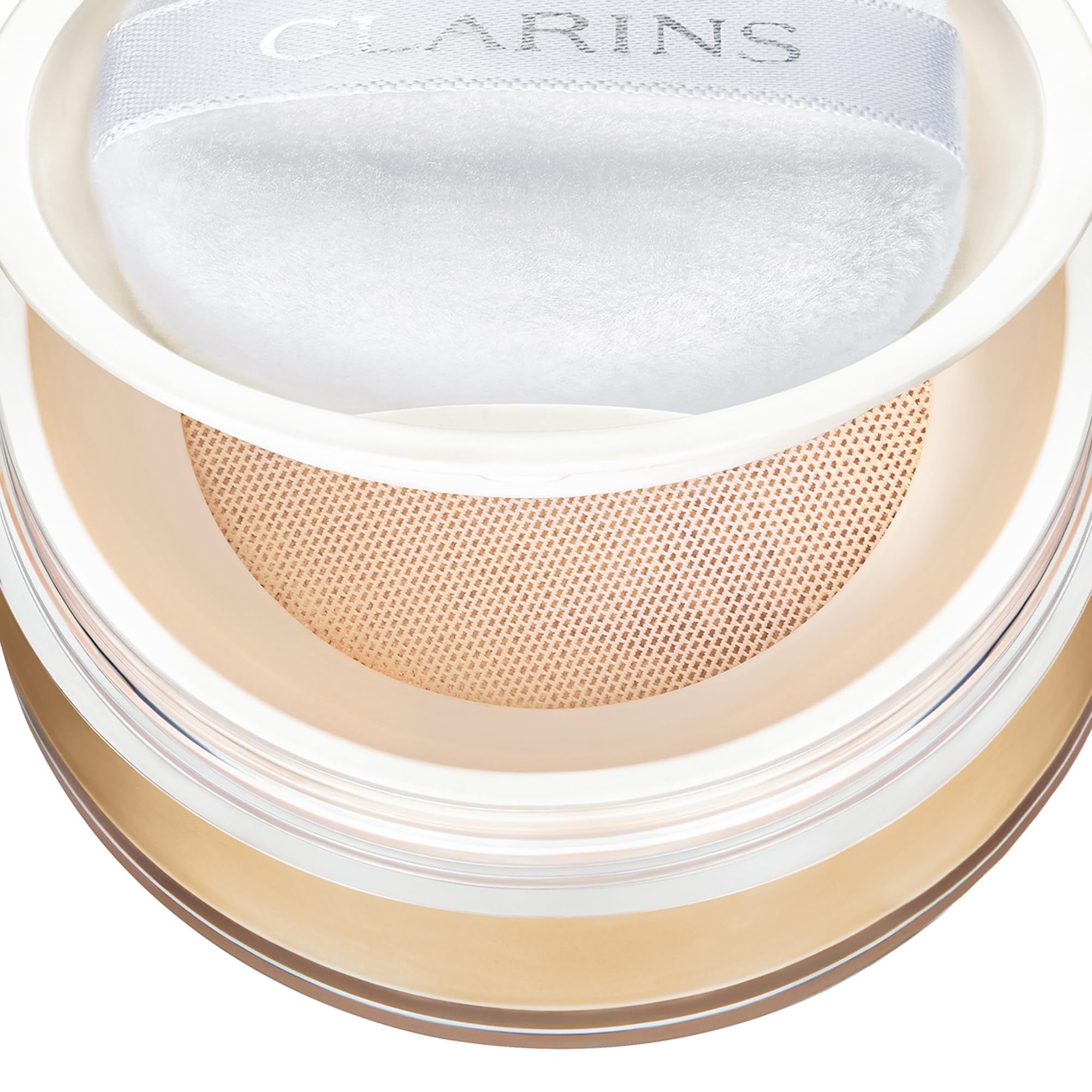 Clarins Ever Matte Loose Powder, Farbton 01. Puder, Schwamm und Sieb in Dose.