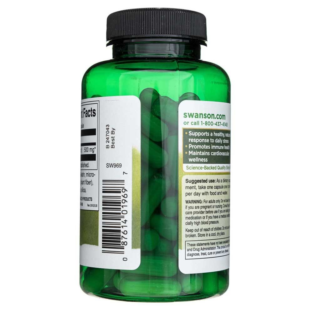 Grüne Flasche mit Swanson Korean Ginseng Kapseln, Einblicke in die Kapseln.