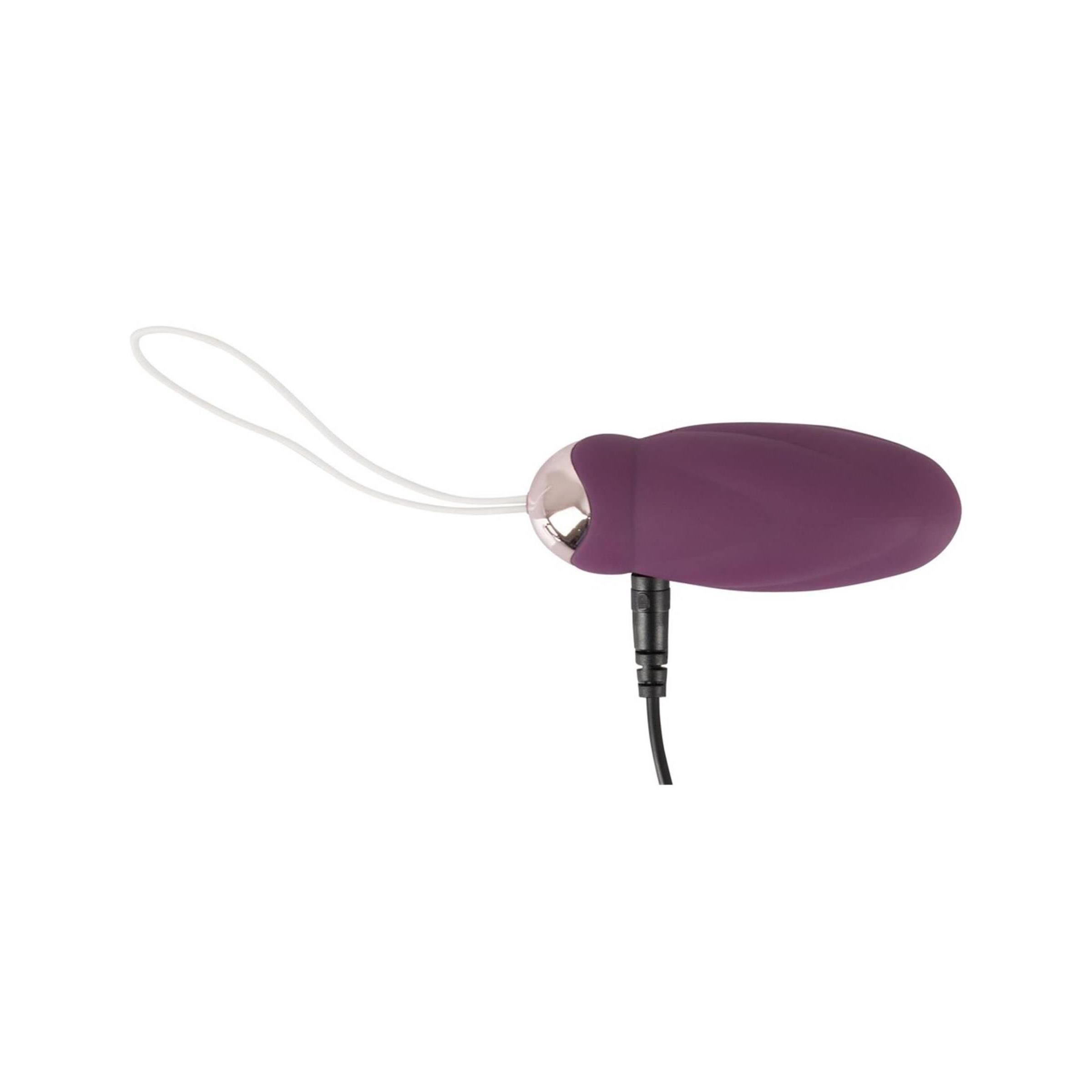 Vibrationskugel mit USB-Anschluss. Kugel in Lila und Gold. Schwarzes Kabel.