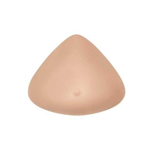 Brustprothese, mittlere Form, hautfarben. Dreieckige Form mit leicht gewölbter Oberfläche. Kleine Vertiefung mittig.