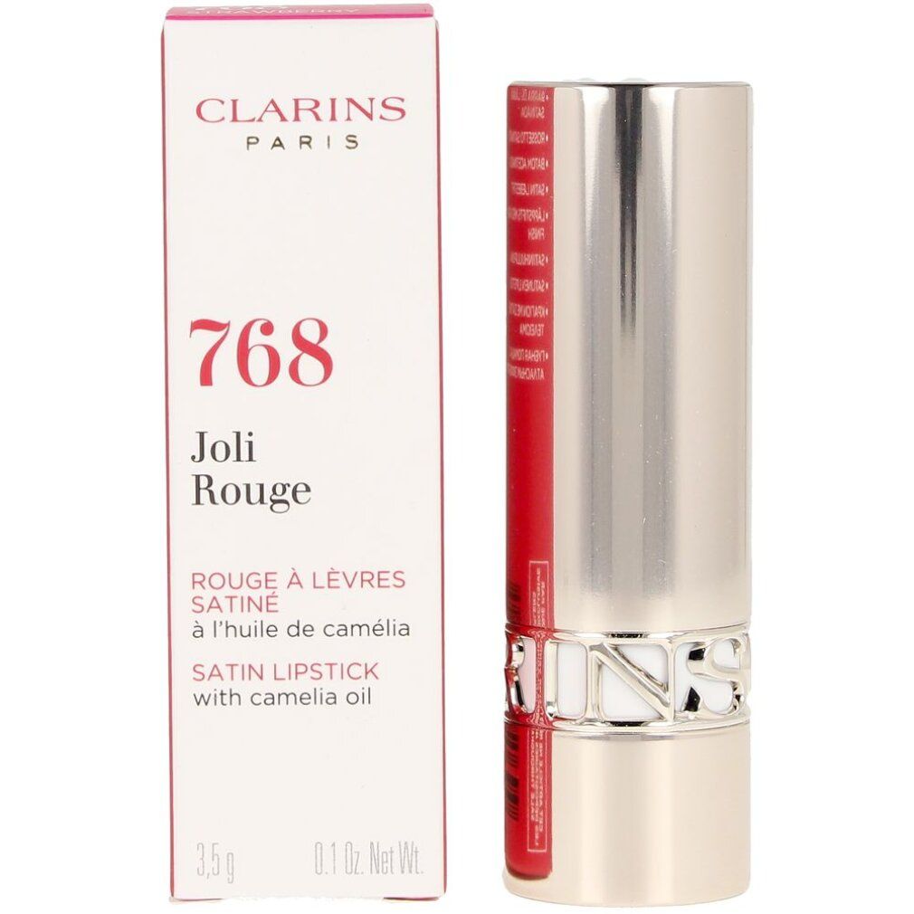 Lippenstift und Verpackung. Auf der Verpackung steht "CLARINS PARIS 768 Joli Rouge". Der Lippenstift ist silberfarben.
