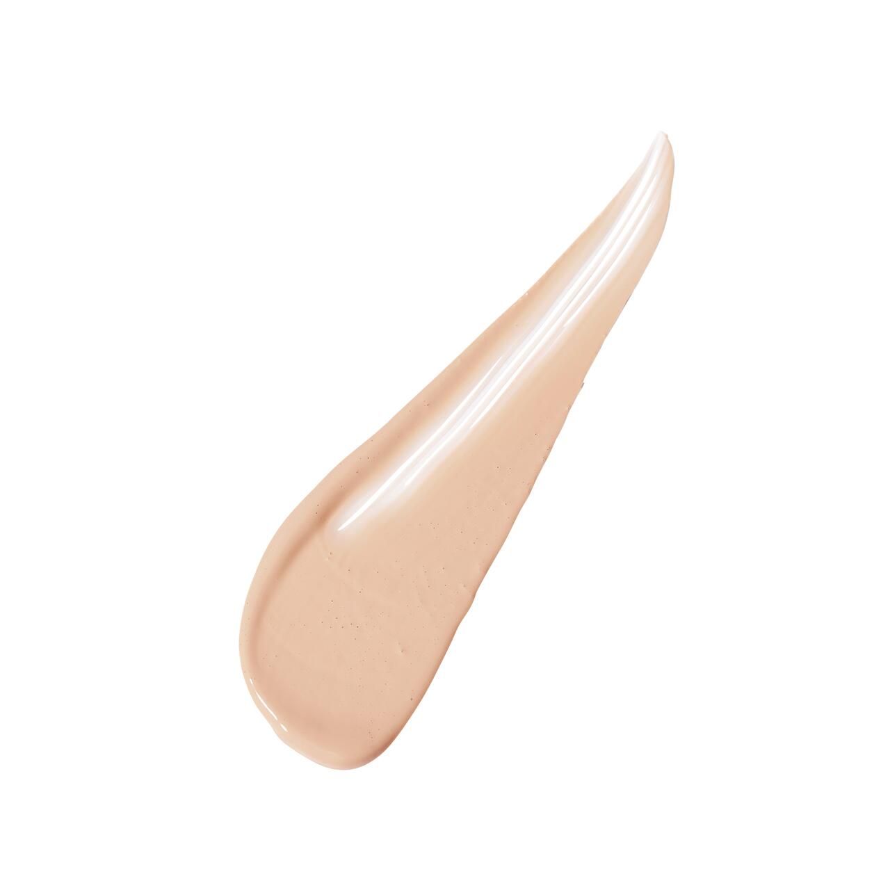 Heller Concealer-Strich. Creme-Textur. Auf weißem Hintergrund.