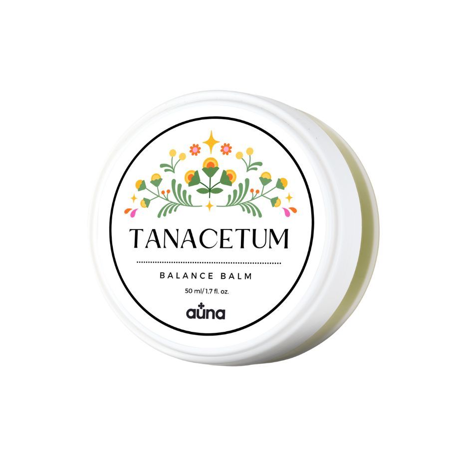 Runde, weiße Dose mit floralem Etikett. Text: TANACETUM BALANCE BALM, 50 ml/1.7 fl oz, auna. Deckel geschlossen.