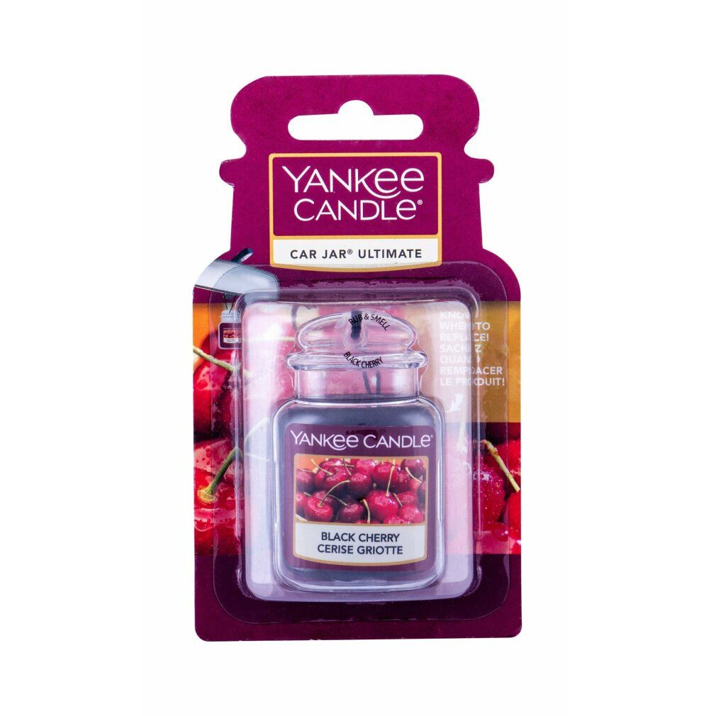 Yankee Candle Autoerfrischer. Schwarze Kirsche. In Verpackung. Klares Glasgefäß mit Metallverschluss. Kirschabbildung. "Cerise Griotte" Text.