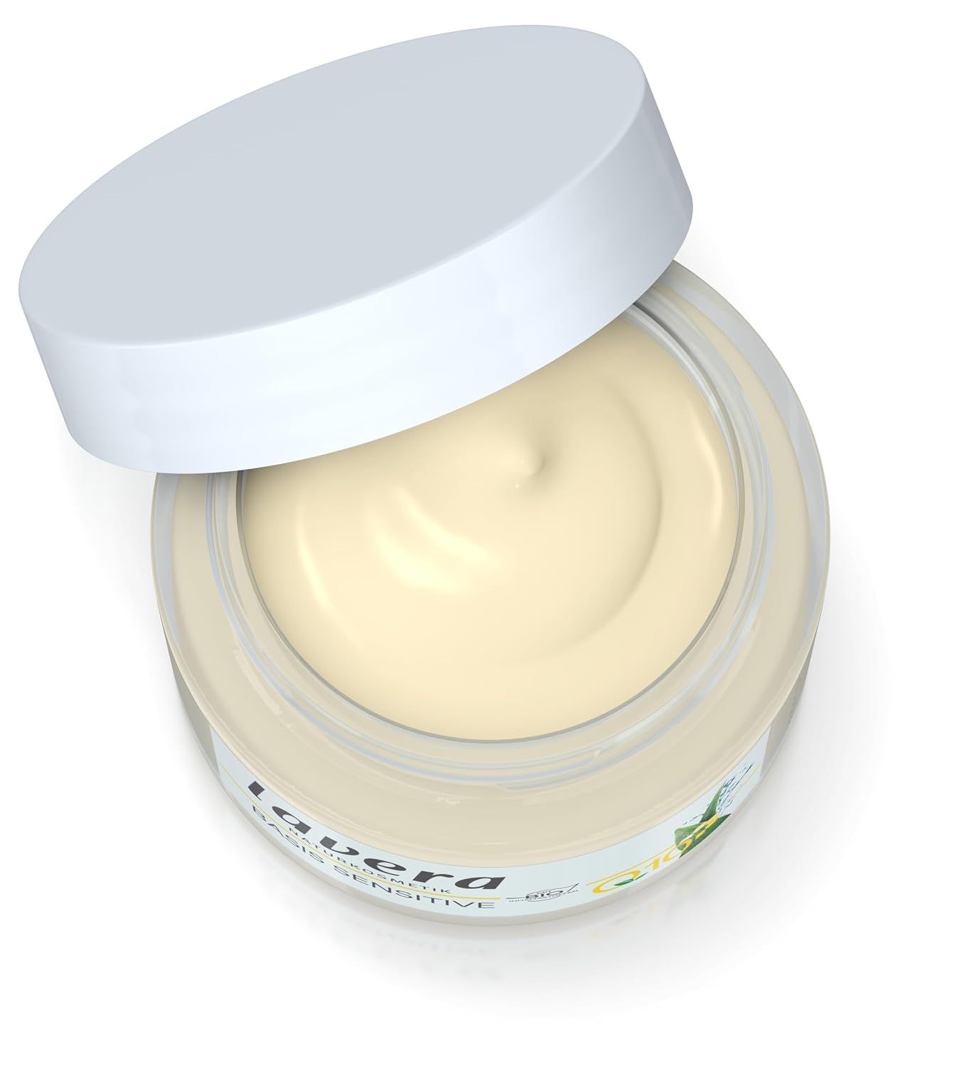 Creme in einem Glas mit offenem Deckel. Auf dem Glas steht "lavera Basis Sensitive".