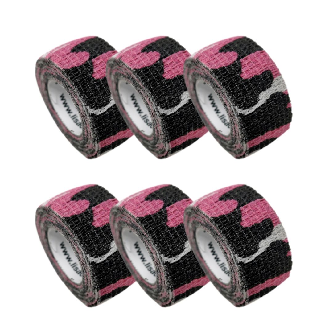 Sechs Rollen LisaCare Fingerpflaster mit pinkem Camouflage-Muster.