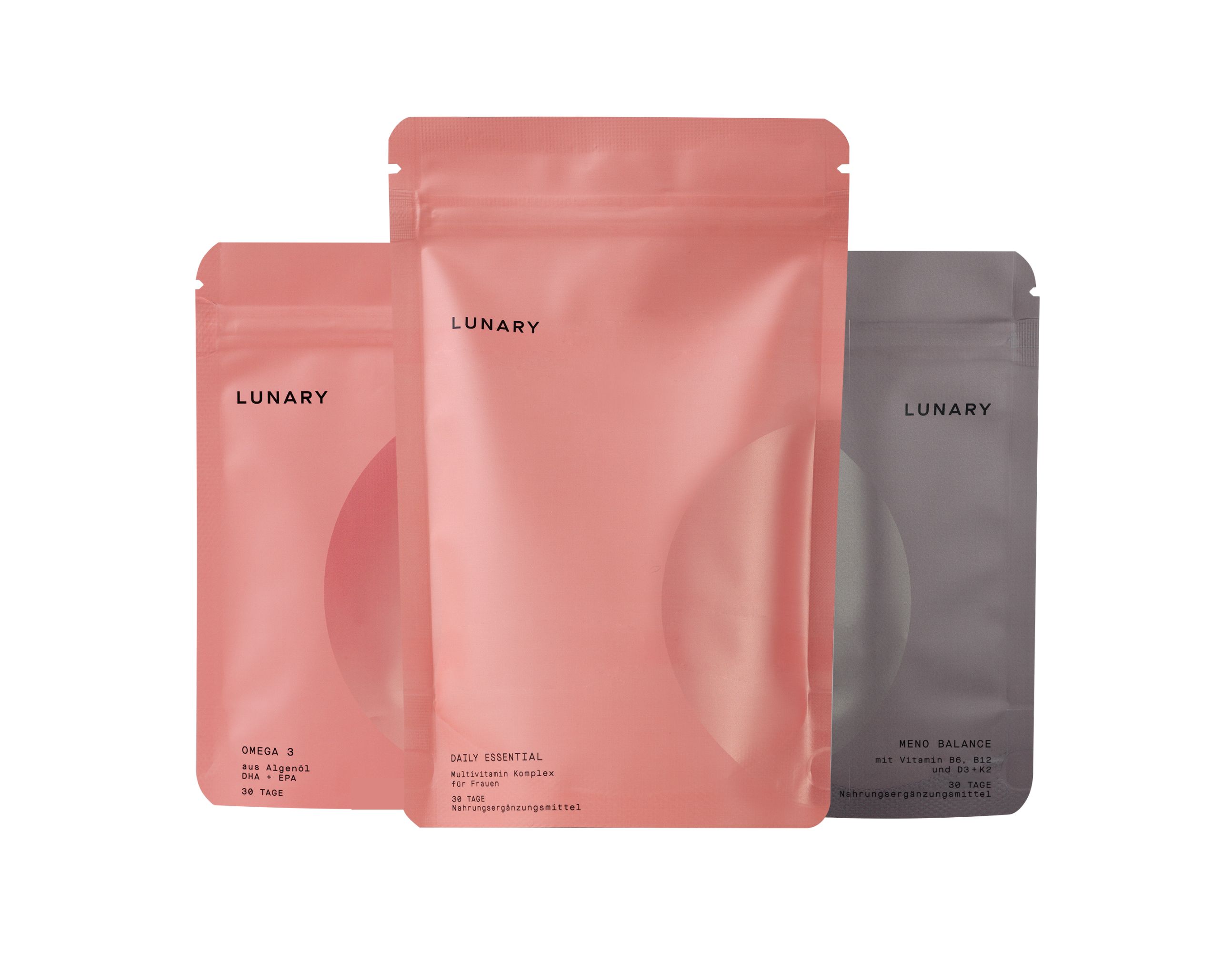 Drei Beutel. Rosa, hellrosa und grau. Aufschrift: LUNARY. Produkt: Meno Balance.