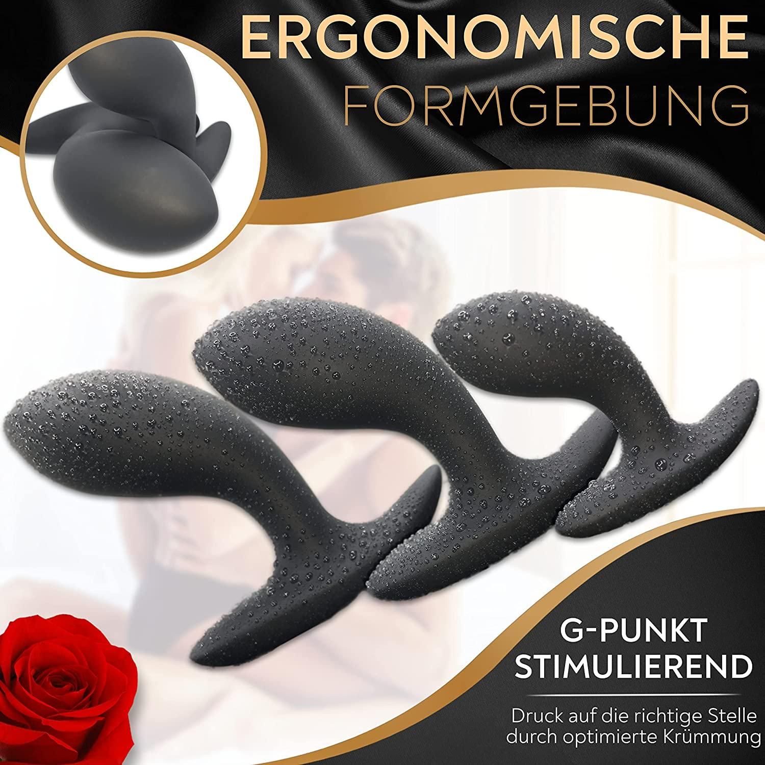 Drei schwarze Analplugs, verschiedene Größen, mit Text: Ergonomische Formgebung, G-Punkt stimulierend.