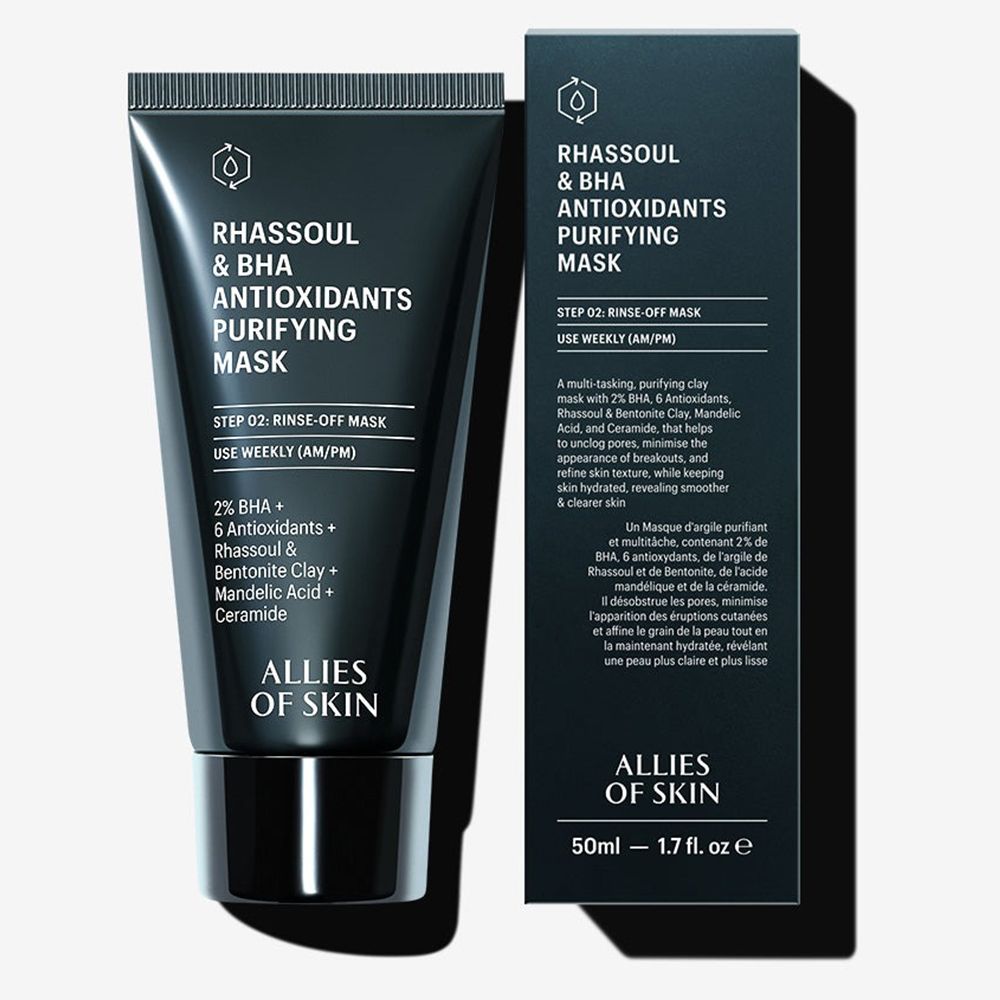 Schwarze Tube und Schachtel. Text: Rhassoul & BHA Antioxidants Purifying Mask. 50ml - 1.7 fl. oz. Auf der Schachtel: Produktbeschreibung.