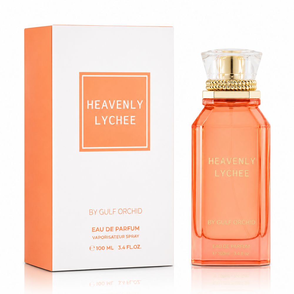 Orangefarbene Glasflasche "Heavenly Lychee" neben passender orange-weißer Verpackung.