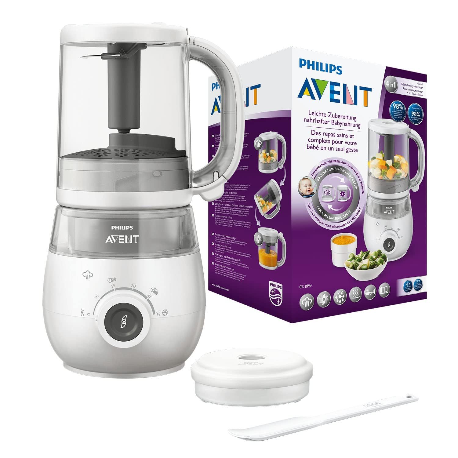 Babykostzubereiter mit Verpackung. Weißes Gerät mit Griff, Behälter und Zubehör. Verpackung mit Produktbildern und Text.
