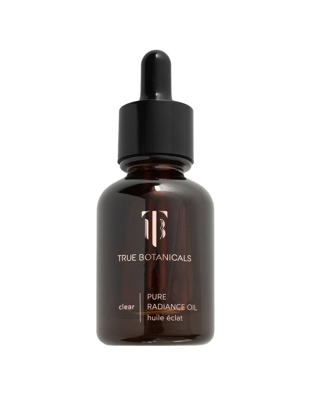 Braune Glasflasche mit schwarzem Deckel und Pipette. Aufschrift: TRUE BOTANICALS, PURE RADIANCE OIL, huile éclat.