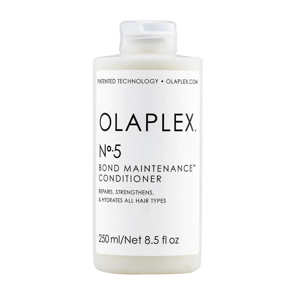 Weiße Flasche Olaplex Nº5 Bond Maintenance Conditioner. Enthält 250 ml/8,5 fl oz. Repariert, stärkt und hydratisiert alle Haartypen.