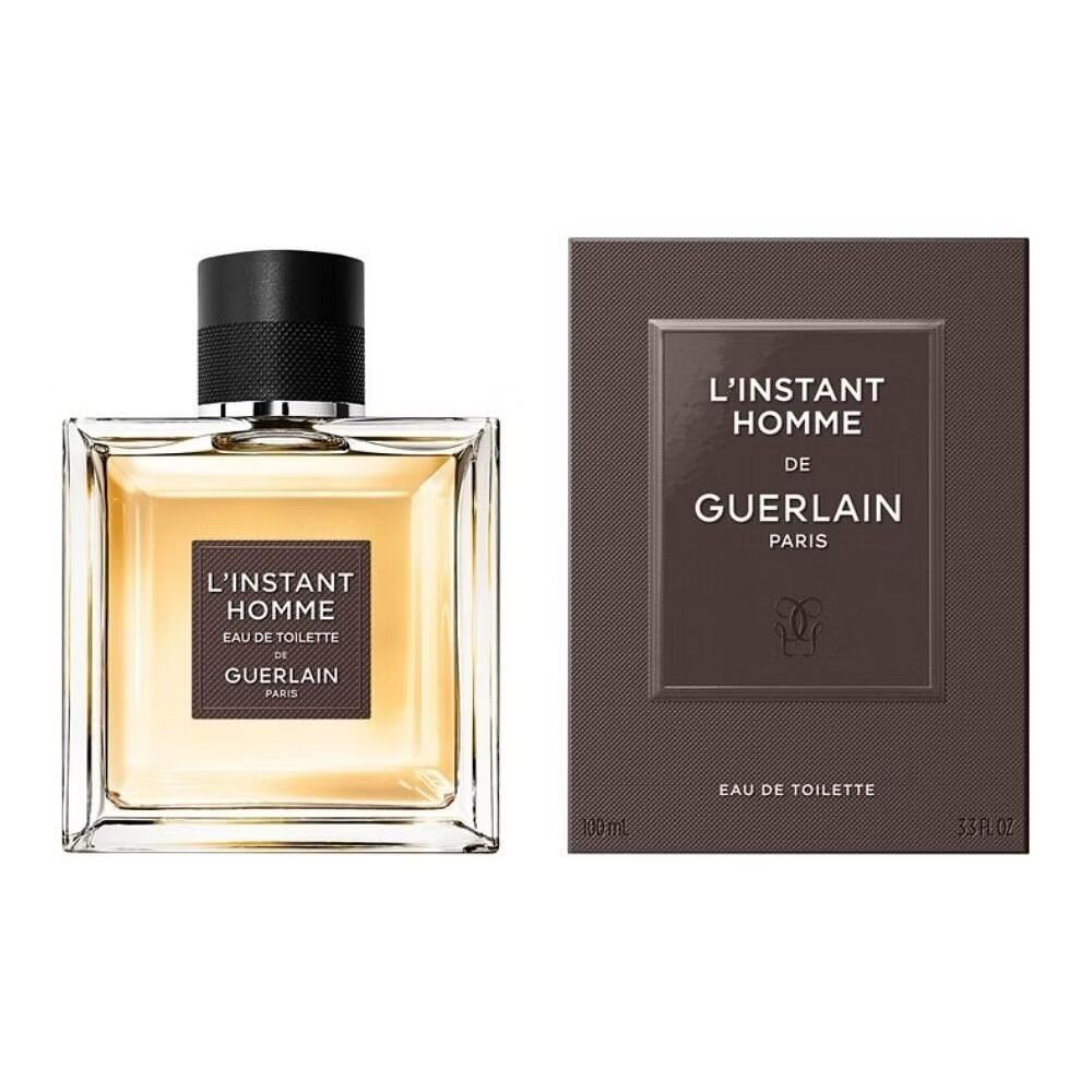 Flakon und Verpackung von Guerlain l'Instant Homme Eau de Toilette. Eckiger Flakon, braune Verpackung mit Logo.