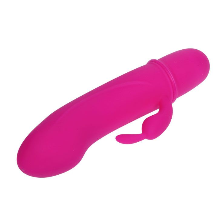 Pinkfarbener Vibrator mit gebogener Form und einer zusätzlichen Ausbuchtung. Auf weißem Hintergrund.