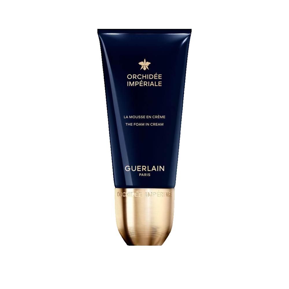 Dunkelblaue Tube mit goldenem Verschluss. Orchidée Impériale, Guerlain Paris. Aufschrift: La Mousse en Crème, The Foam in Cream.