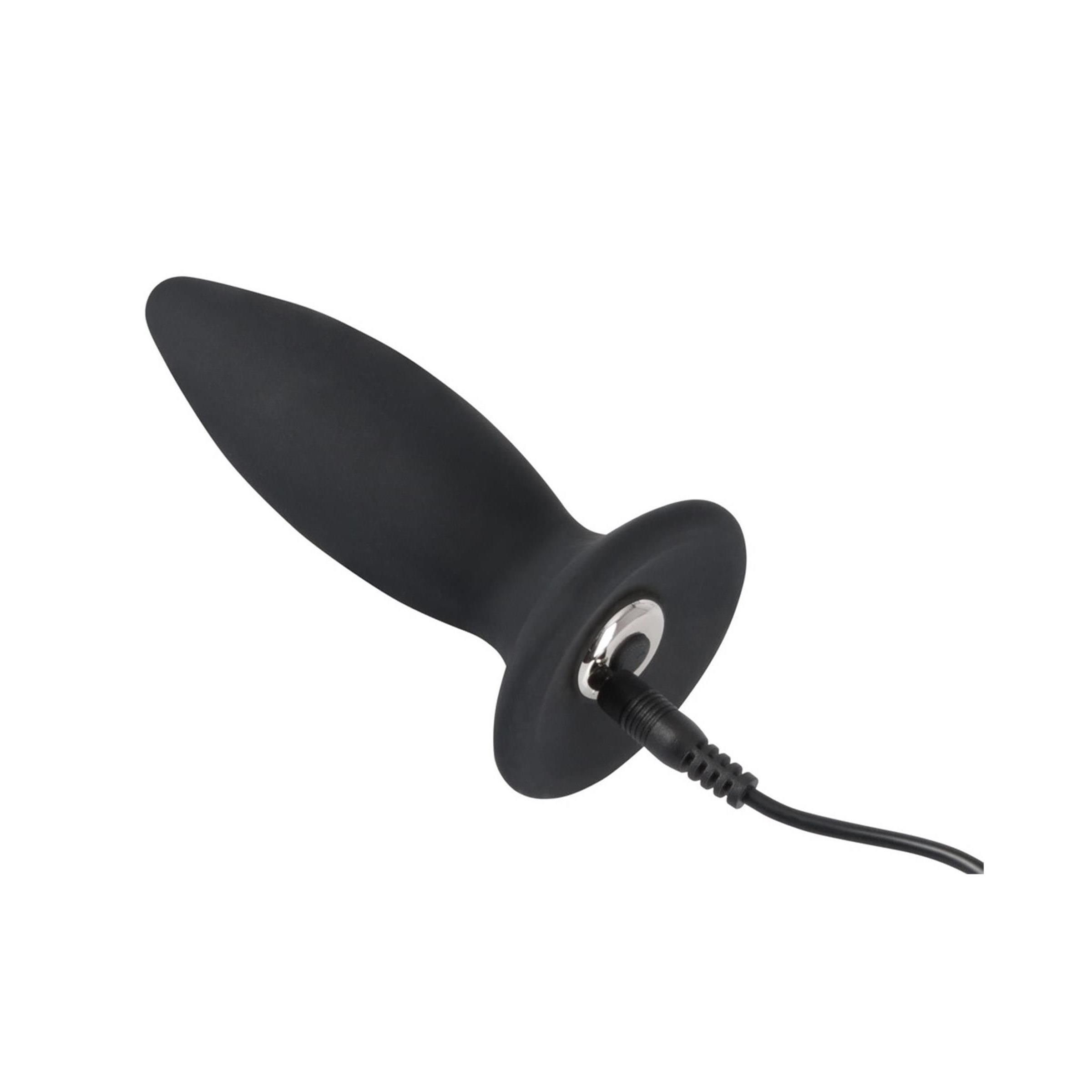 Schwarzer Plug mit Ladeanschluss. Kabelanschluss an der Basis.