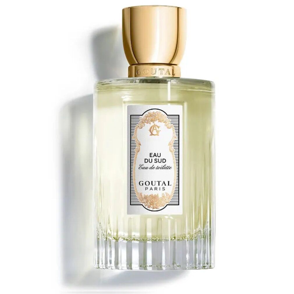 Goutal Paris Eau Du Sud Eau De Toilette Spray. Rechteckige Glasflasche mit goldenem Deckel. Weißes Etikett mit Text und Verzierungen.