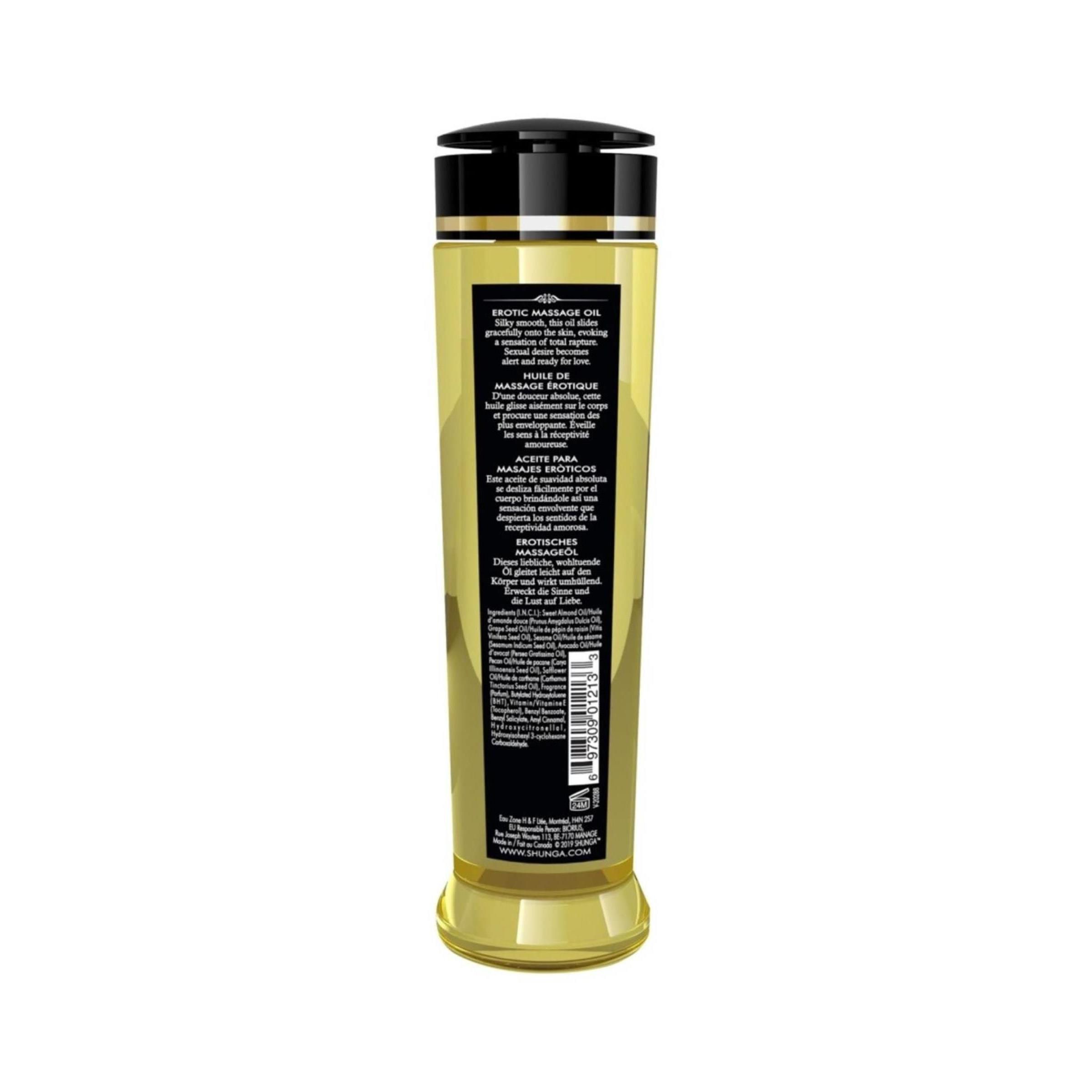 Rückseite einer Shunga Massageöl Serenity Monoi Flasche mit detaillierten Anwendungshinweisen und Inhaltsstoffen in mehreren Sprachen.