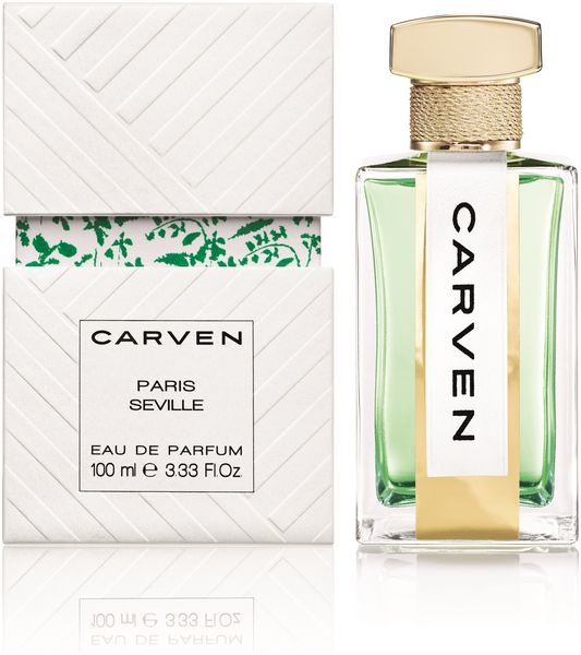 Carven Paris Séville Eau de Parfum Flakon und Verpackung. Rechteckiger Glasflakon mit goldfarbenem Verschluss. Weiße Verpackung mit Logo.