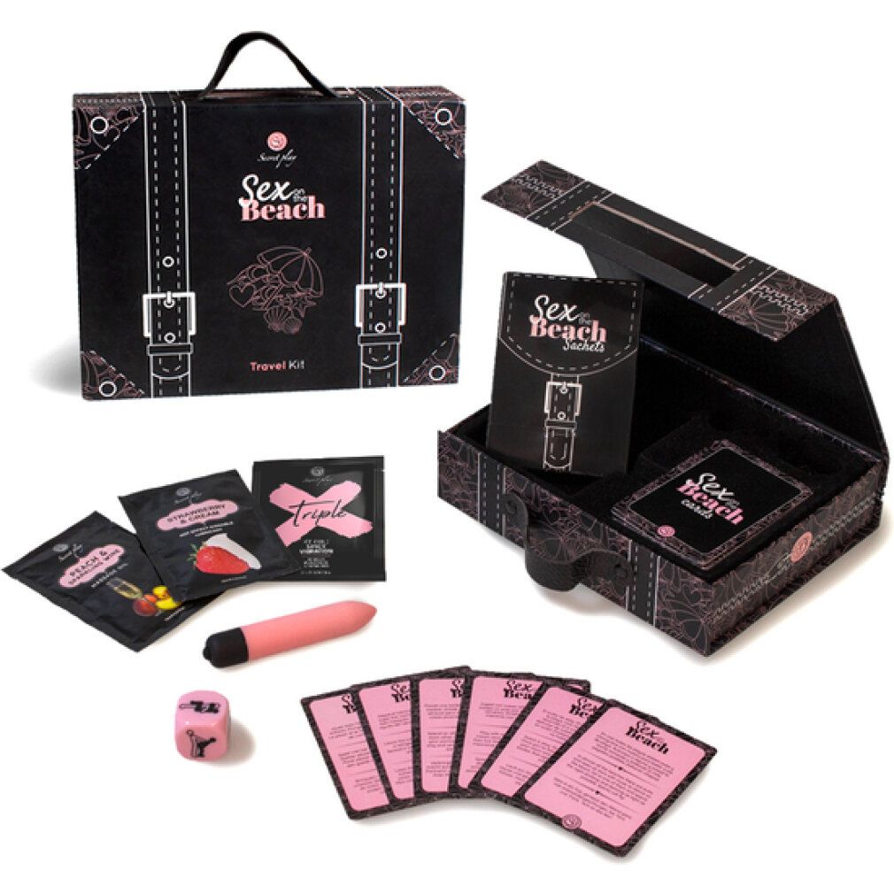 Geöffnete schwarze Kofferbox mit Inhalt. Enthält Karten, Würfel, Vibrator und Beutel. Aufschrift: Sex on the Beach Travel Kit.