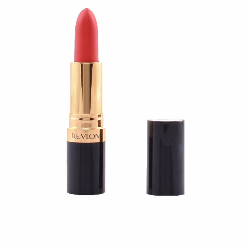 Roter Lippenstift und schwarze Kappe daneben. Goldene Hülse, Marke REVLON.