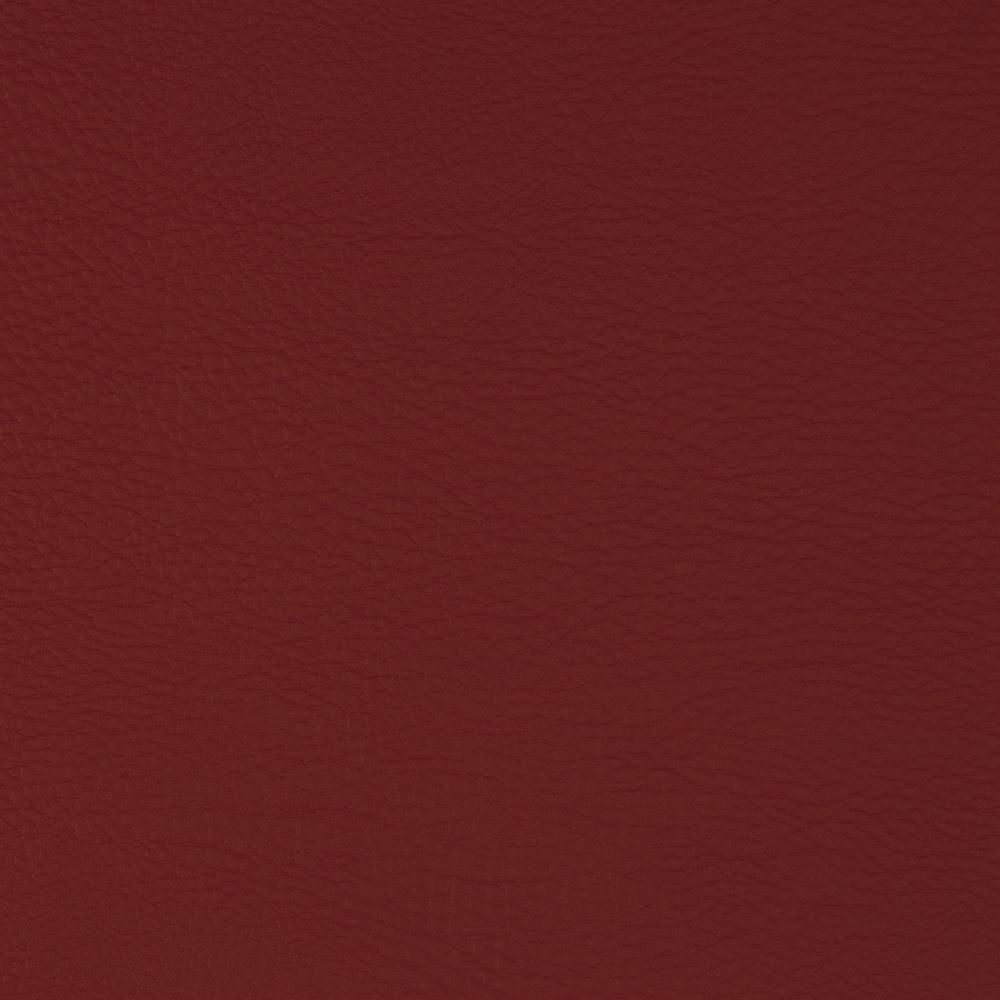 Nahaufnahme einer burgunderfarbenen, lederartigen Oberfläche. Texturdetails sichtbar.