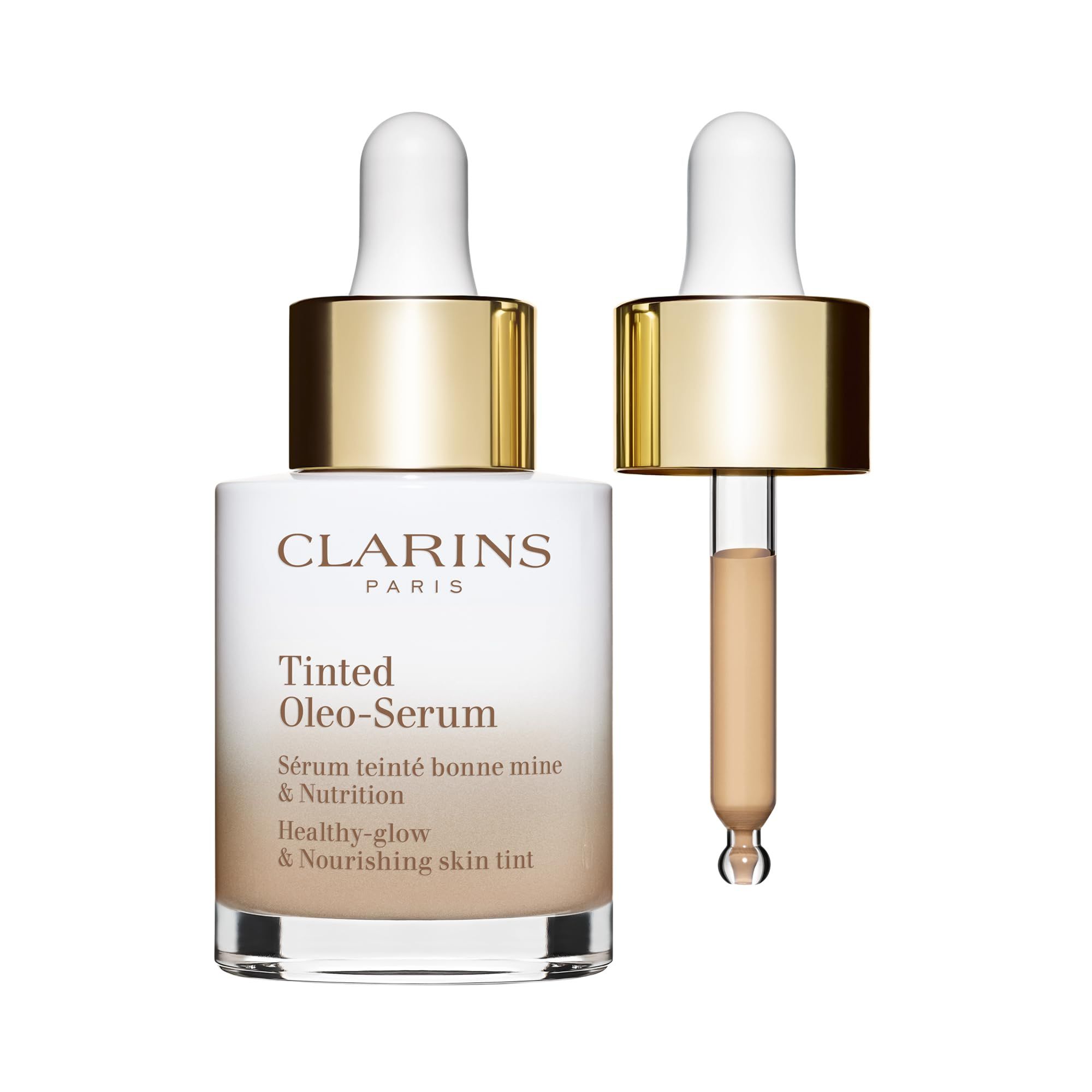 Clarins Oleo-Serum Flasche mit Pipette. Weiß-braunes Glas, goldener Verschluss. Pipette mit getönter Flüssigkeit. Schriftzug: Clarins Paris.