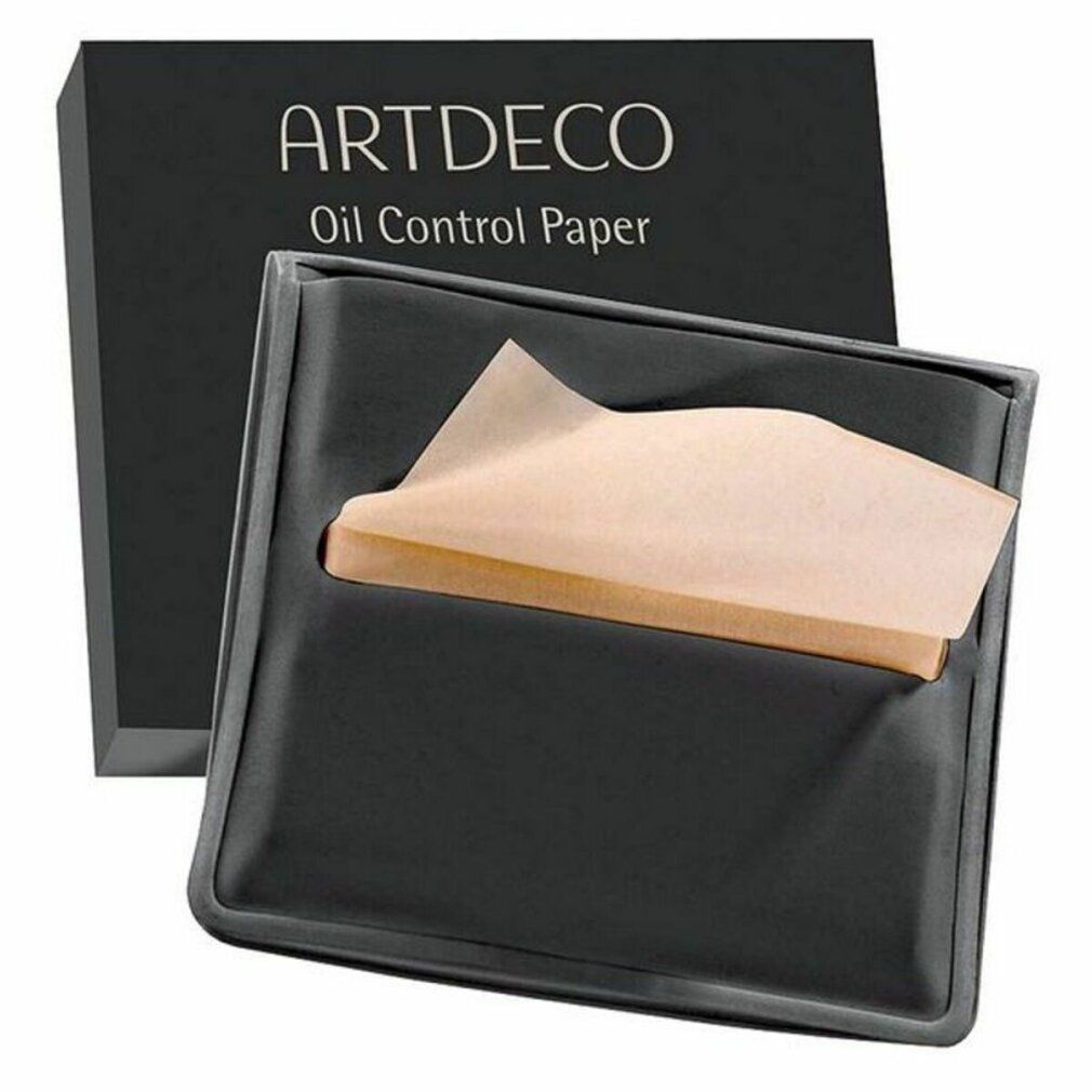 Schwarze Verpackung mit "ARTDECO Oil Control Paper"-Aufdruck. Ölpapiere in einem schwarzen Halter.