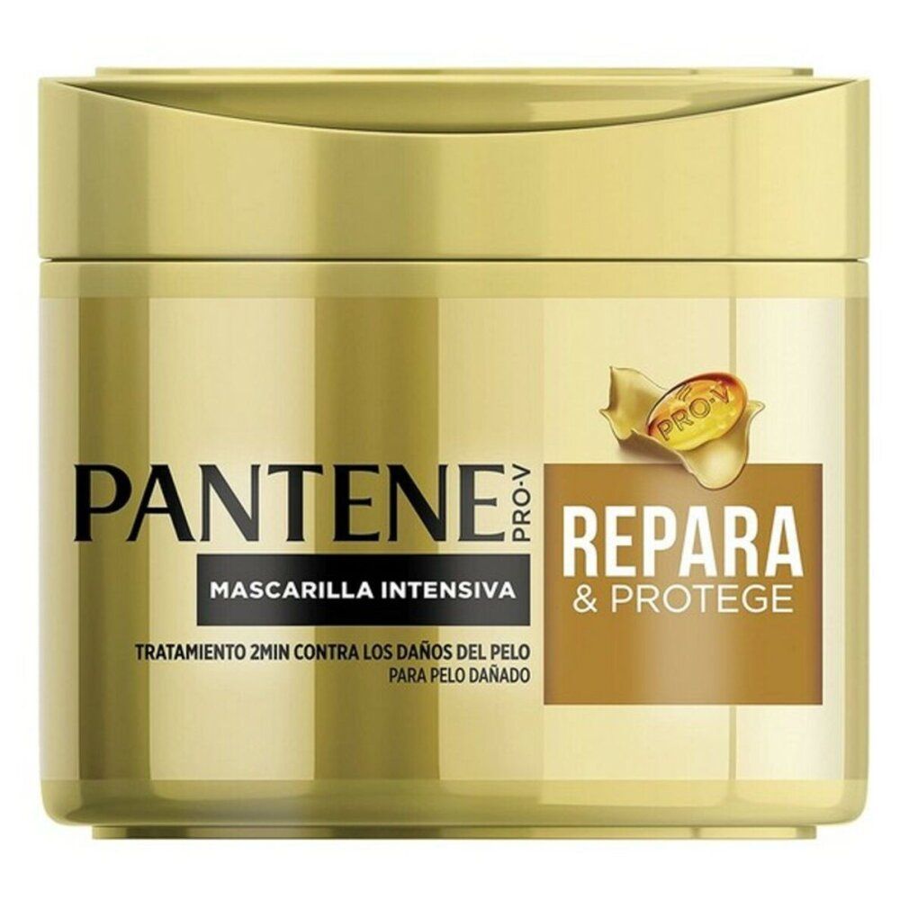 Goldfarbene Dose mit Pantene Pro-V-Logo und Schriftzug REPARA & PROTEGE. Aufschrift: Mascarilla Intensiva.
