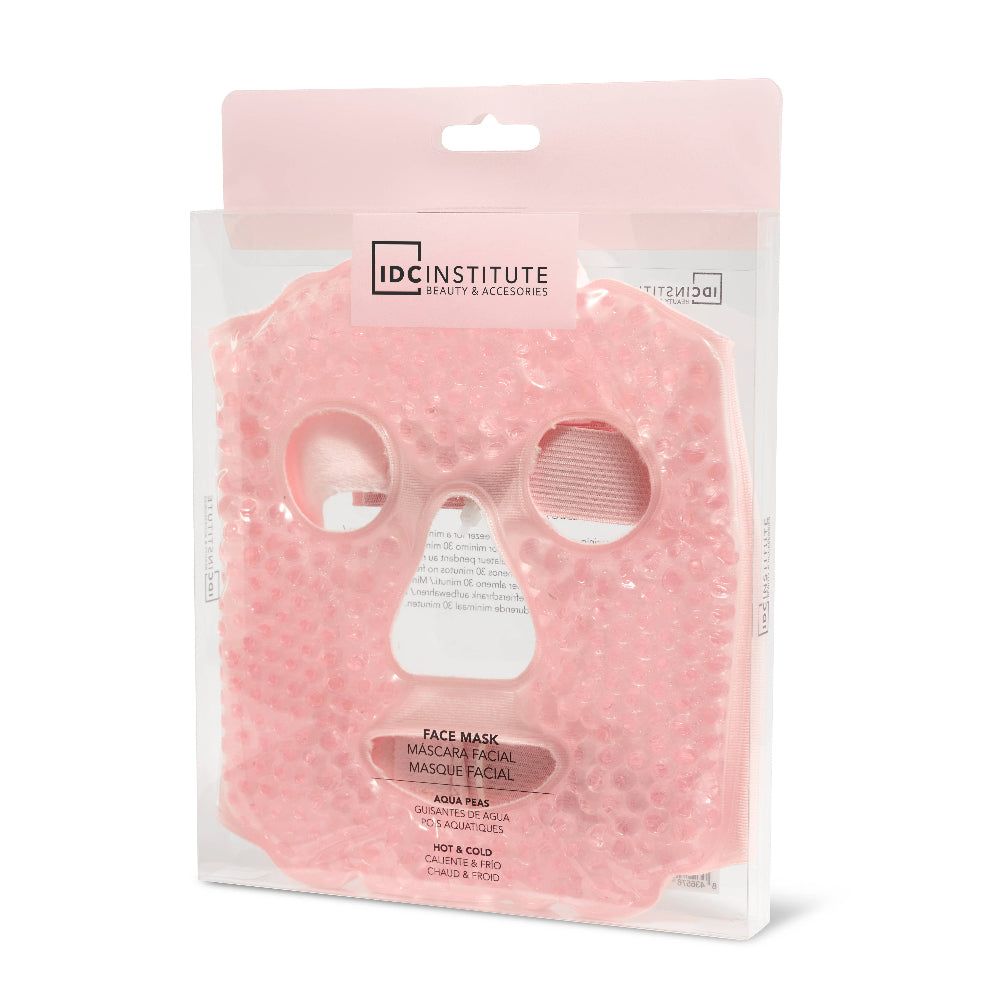 Rosa Gel-Gesichtsmaske in Verpackung. IDC INSTITUTE Logo. Text: Aqua Peas, Face Mask. Für heiße und kalte Anwendung.