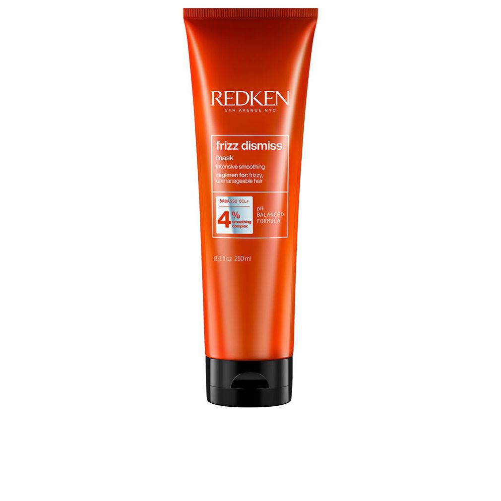 Orangefarbene Tube mit Produktnamen und Text. Schwarzer Deckel. Marke Redken, Produkt Frizz Dismiss Mask.