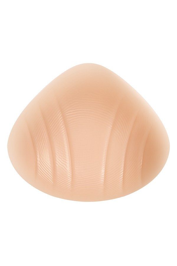 Hautfarbene Prothese mit geriffelter Oberfläche. Tropfenform.