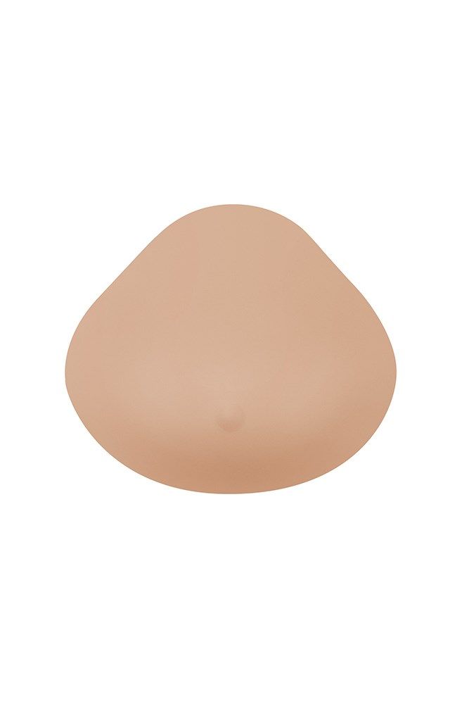 Beige Brustepithese. Tropfenförmig. Für medizinische Zwecke. Glatte Oberfläche.