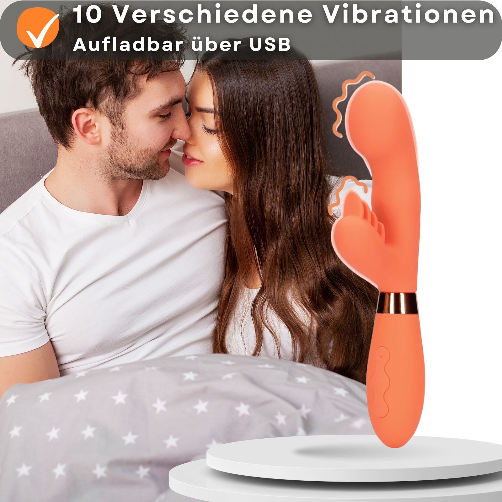Orangener Vibrator. 21 cm lang, 3,5 cm Durchmesser. Gehaltene Hand. Maße angegeben.