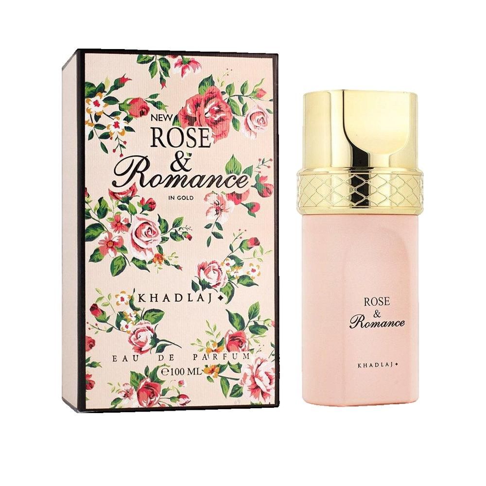 Rosa Flakon neben einer Schachtel. Aufschrift "ROSE & Romance" und "KHADLAJ". Schachtel mit Blumenmuster.