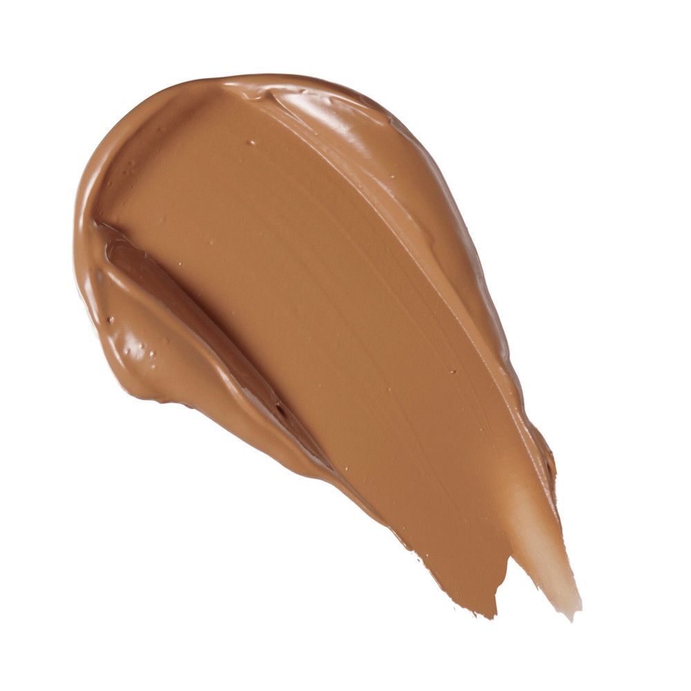 Farbmuster eines Concealers. Helle, goldbraune Farbe. Textur ist cremig und deckend.