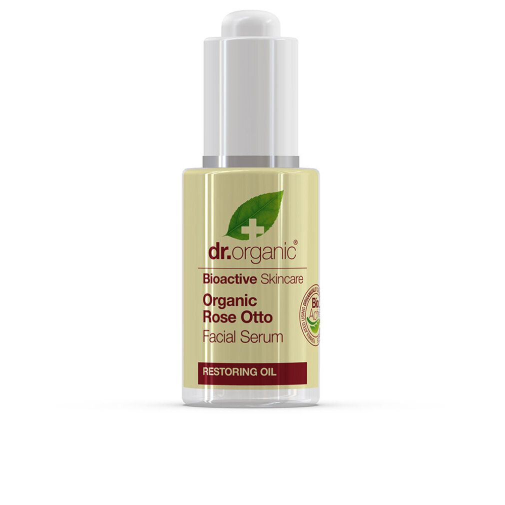 Serumflasche mit Pipette. Aufschrift: Dr. Organic, Organic Rose Otto Facial Serum. Grünes Blatt-Logo.